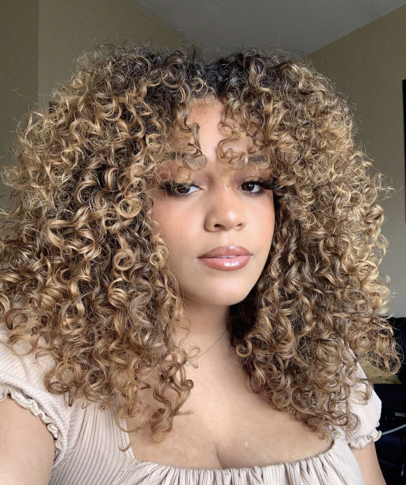 Curly Hair Trend: Defined Center Part with Raised Corners - Bangstyle -  House of Hair Inspiration