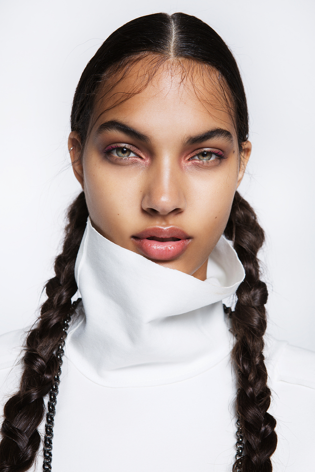 photo of a girl with pigtails at a photoshoot 