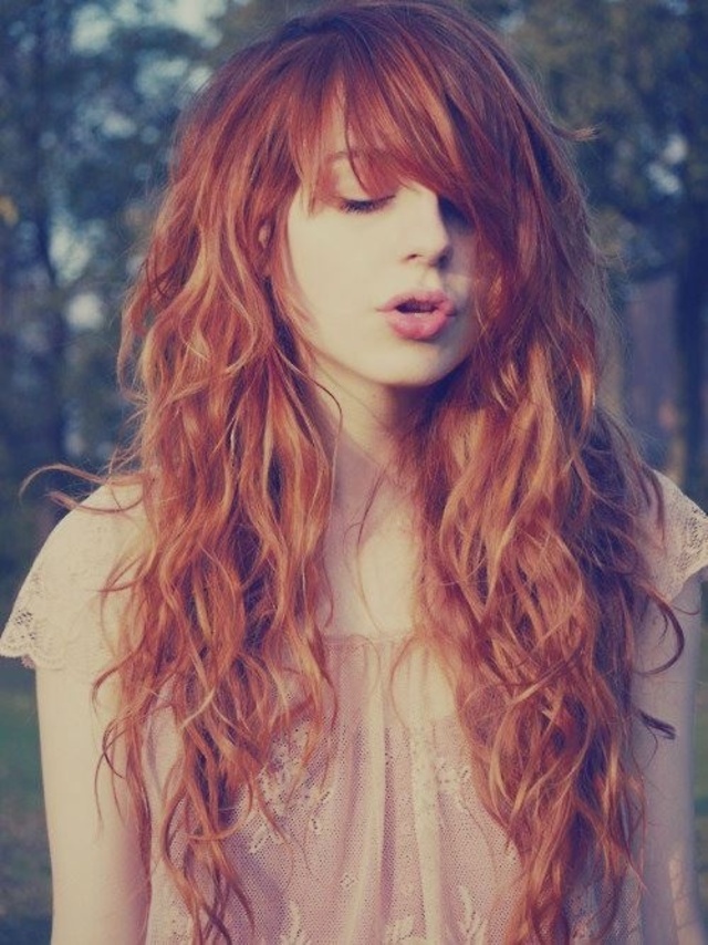 Wavy redhead locks.