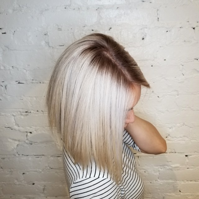Platinum white with shadow roots on Asian hair