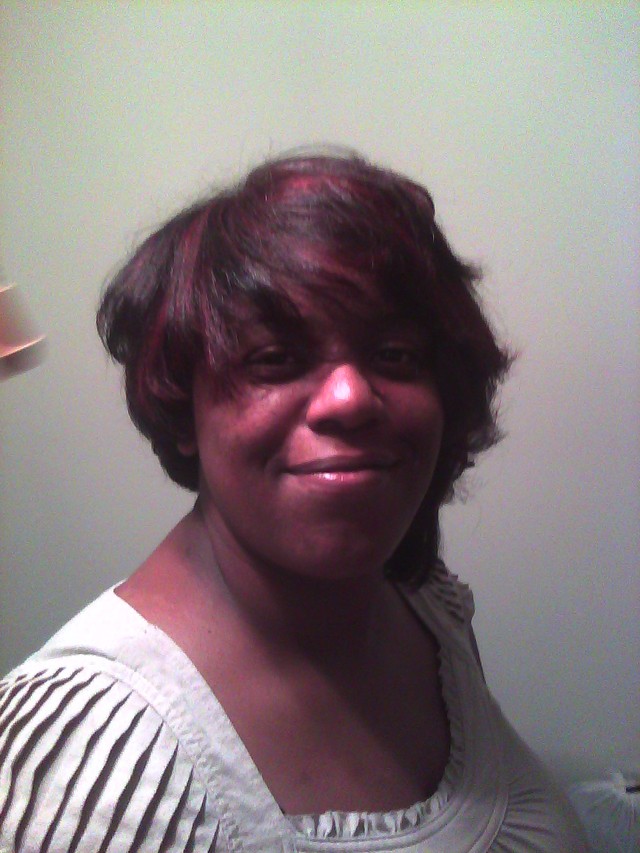 asymetric bob with red highlights