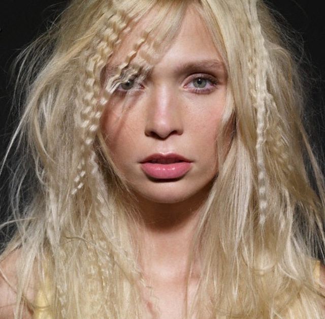 Young Blond Woman with Crimped Hair