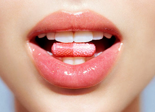 perfume-pill-in-an-attractive-open-mouth-and-lips